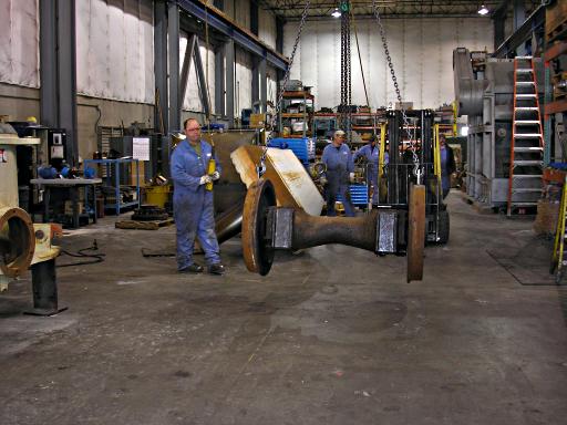 wheelset being lifted by overhead crane