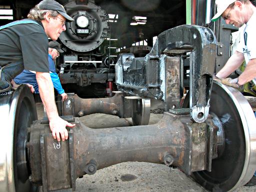 setting side frame onto wheelsets