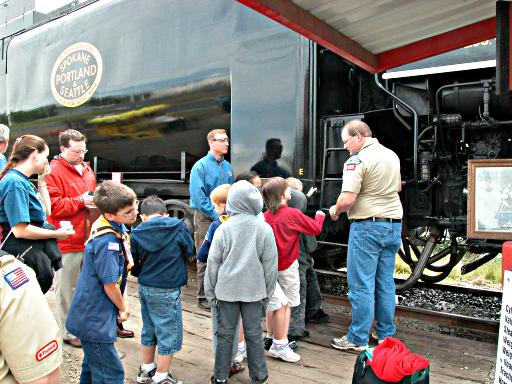 Cub Scout troop alongside 700