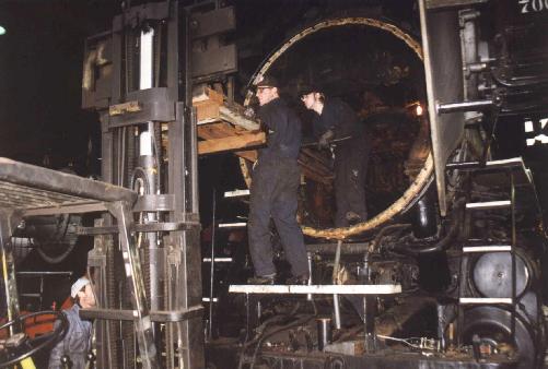 Using a forklift and come-along to pull the superheater units