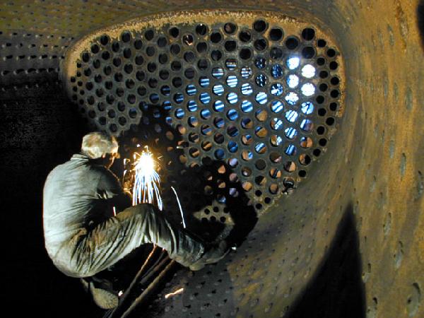 Cutting boiler flues from the firebox