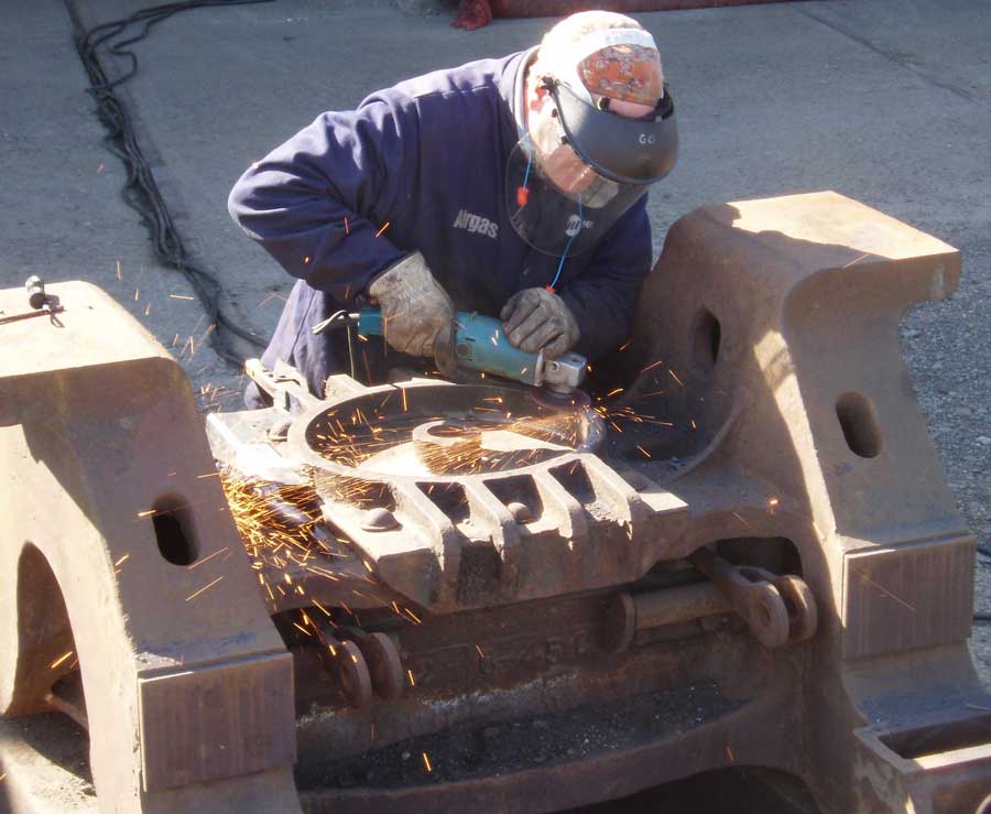 Photo of tender truck being disassembled